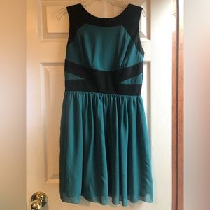 Cute cocktail dress, green and black. Zip back. Worn once